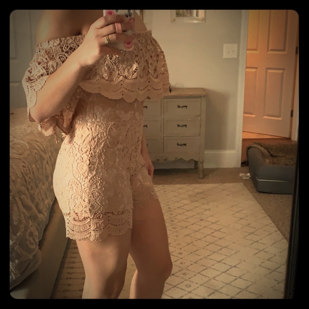 Blush lace romper with gold zipper